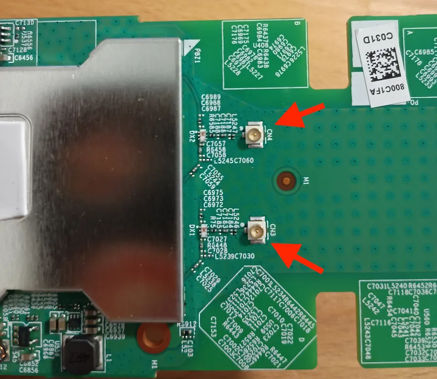 Top half of the RP-AX58's PCB with the IPEX1 antenna connectors highlighted.