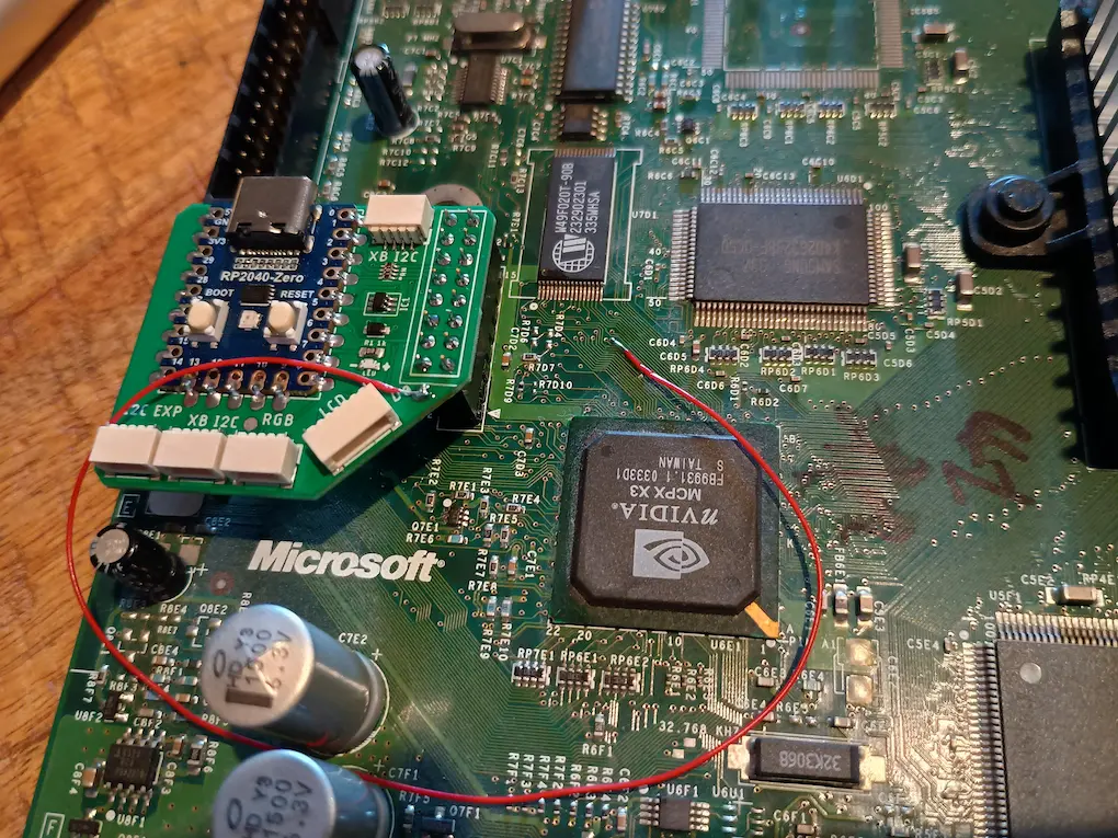 Photo of Modxo installed on the Xbox motherboard.